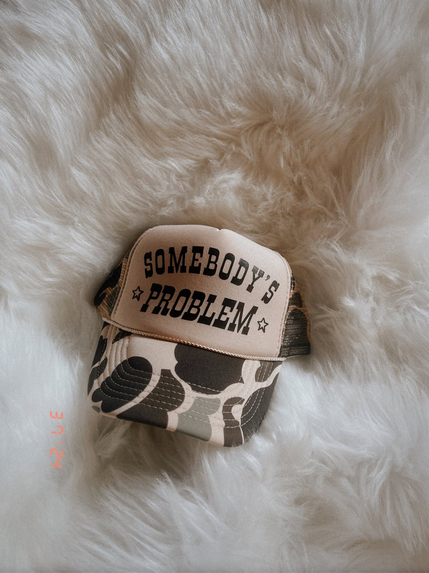 Somebody’s Problem Trucker Hat