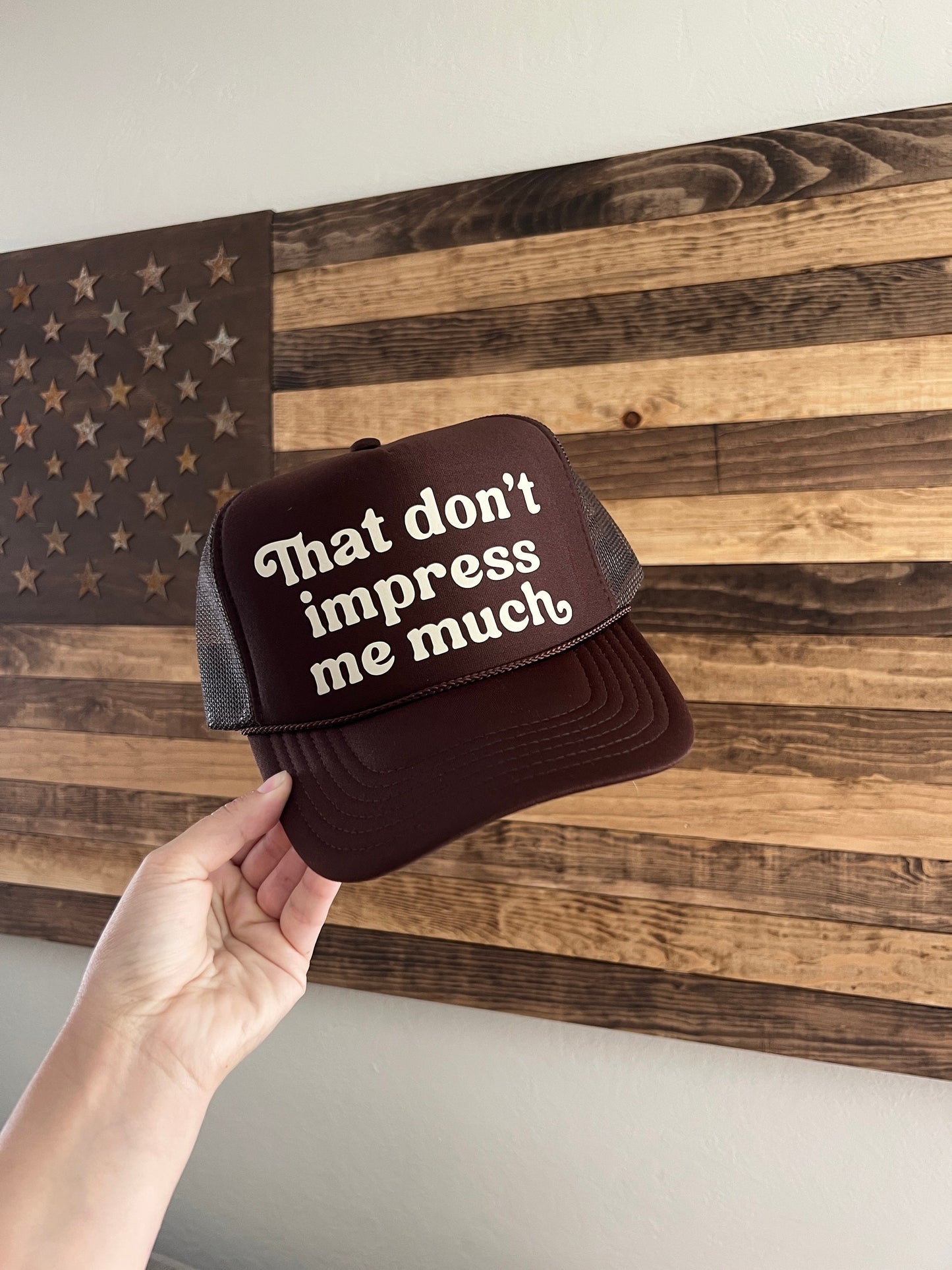 That Don’t Impress Me Much Brown Trucker Hat