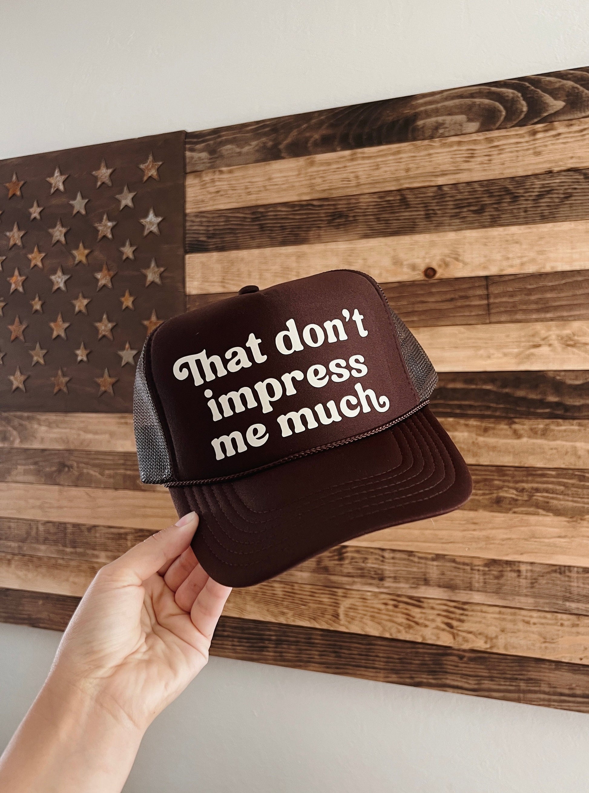 That Don’t Impress Me Much Brown Trucker Hat
