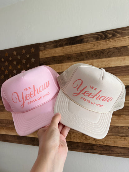 Hats in image: (Left) Light pink hat, coral pink design (Right) Tan hat, coral pink design