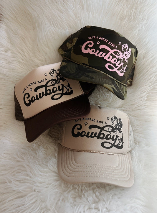 Hats shown in image: Top: All Over Camo hat (currently out of stock), Light Pink design Middle: Brown/Tan hat, Black design Bottom: Khaki hat, Black design