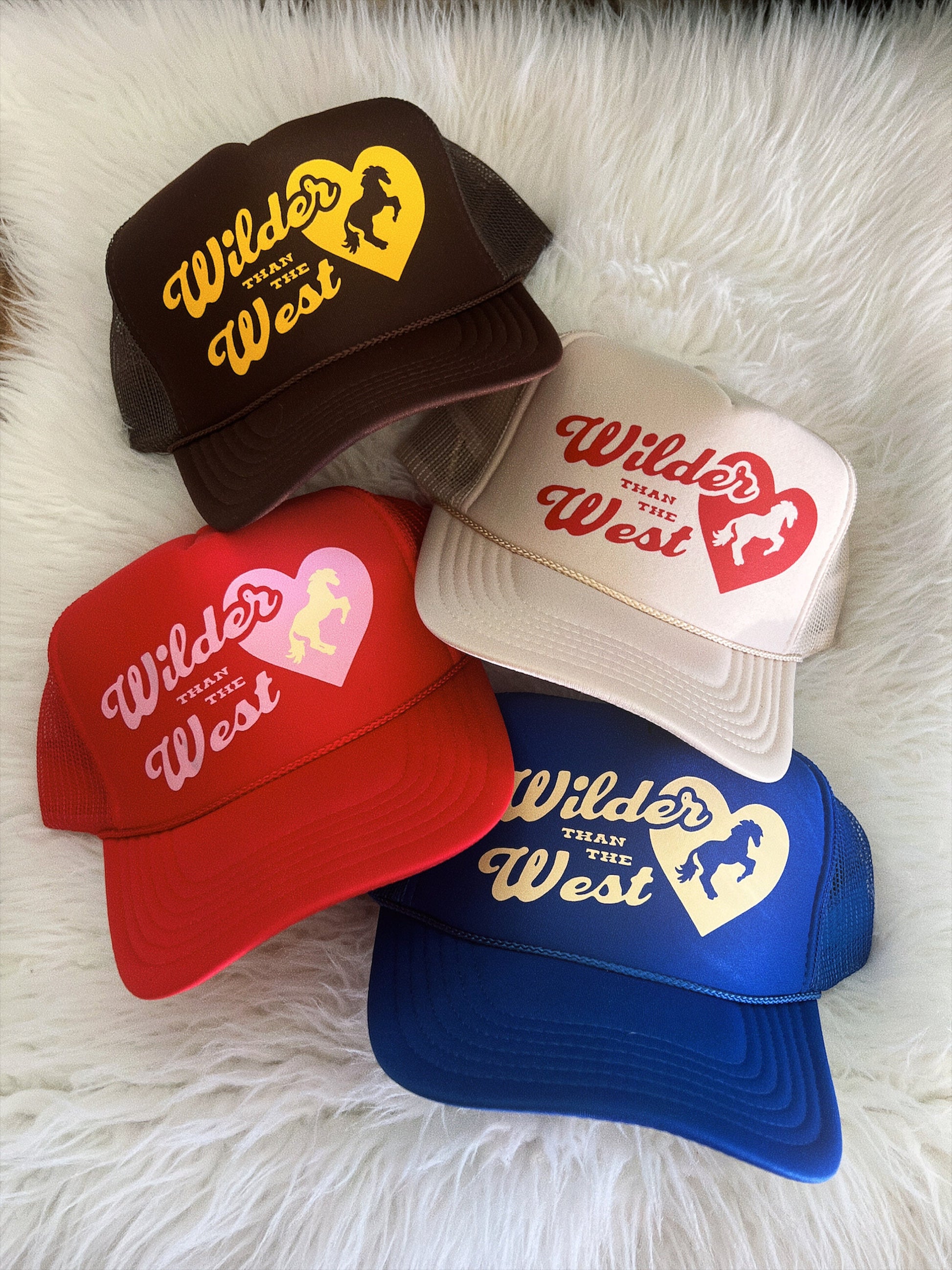 Hats shown in picture: 1. (Top) Brown hat, Mustard Yellow design 2. (Left) Red hat, Light Pink design, Cream horse emblem 3. (Right) Tan hat, Red design 4. (Bottom) Royal Blue hat, Cream design